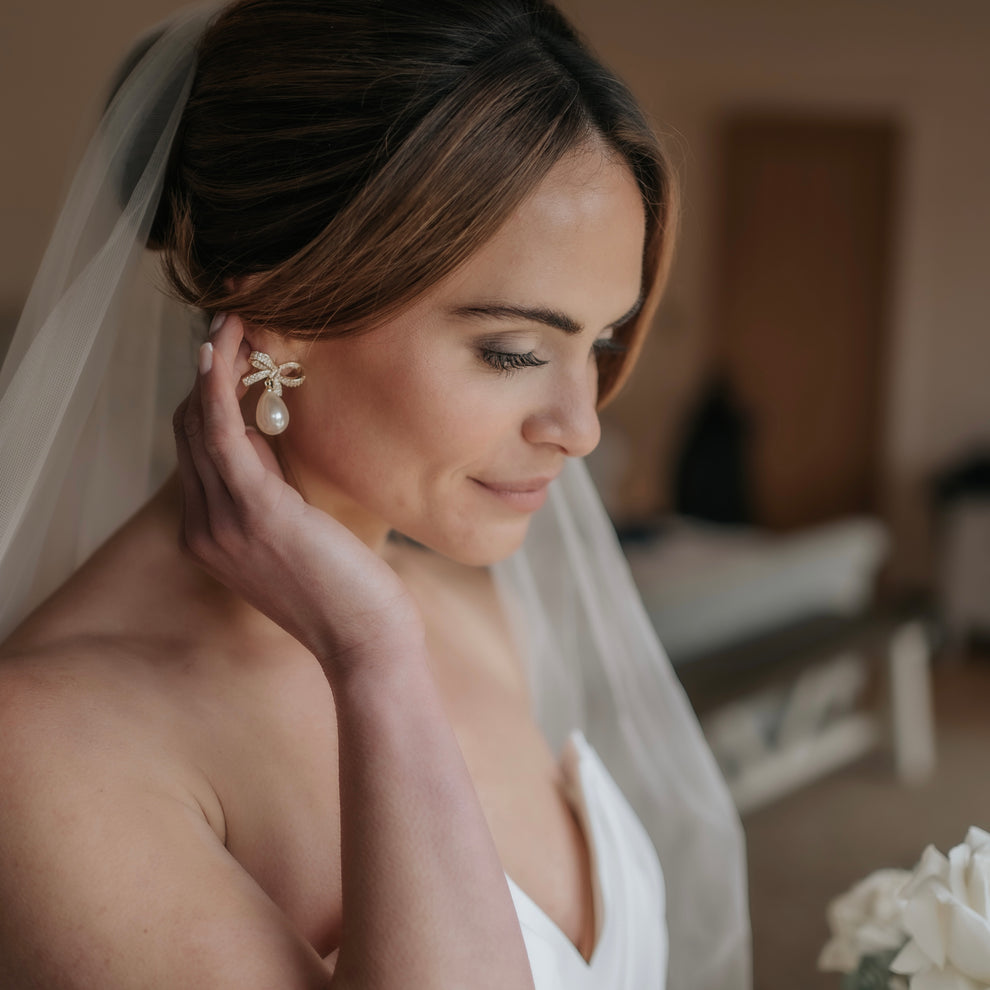 Gold Crystal Bow & Pearl Earrings Gold